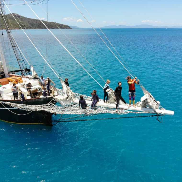 a small boat in a body of water