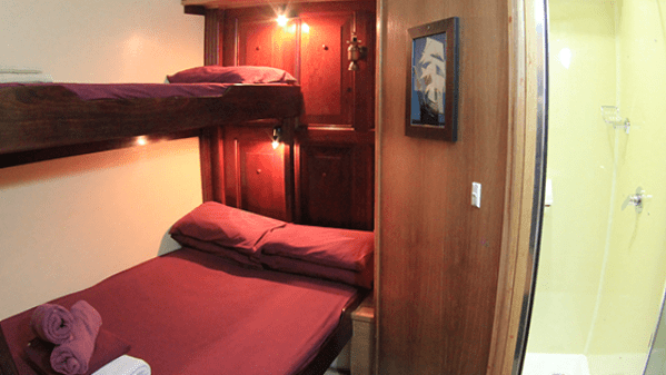 Solway Lass – Private Ensuite Cabin a double bed in a room