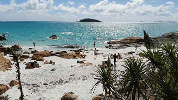 Solway Lass – Whitehaven Beach out to sea a group of people on a sandy beach next to the ocean