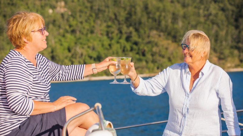 a man and a woman sitting on a bench