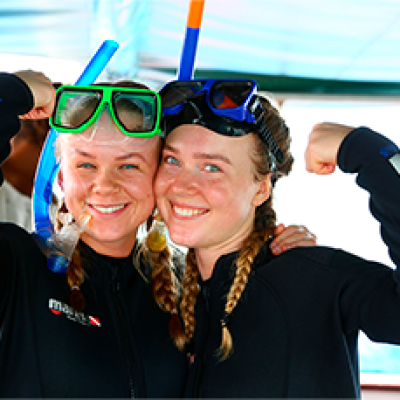 a group of people posing for the camera