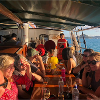 a group of people standing in front of a crowd