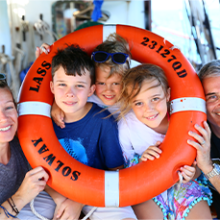 a group of people posing for the camera