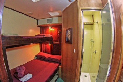 a bedroom with a large mirror